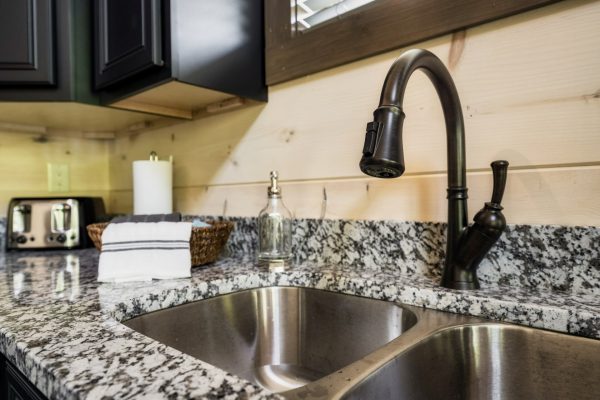 Dual sinks and black faucet fixtures - perfectly harmonized the kitchen